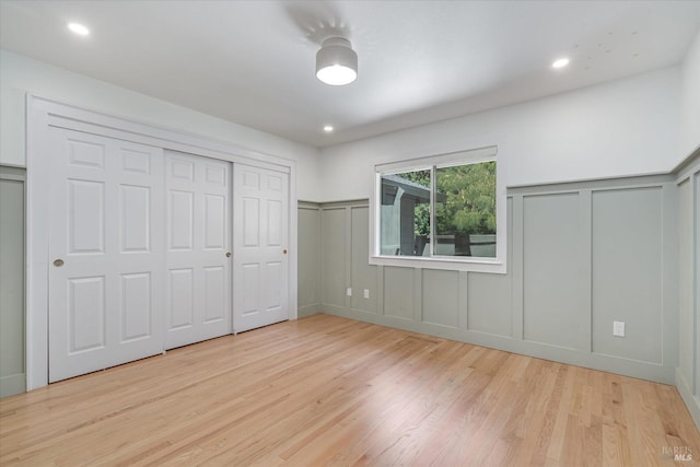 unfurnished bedroom featuring light hardwood / wood-style flooring