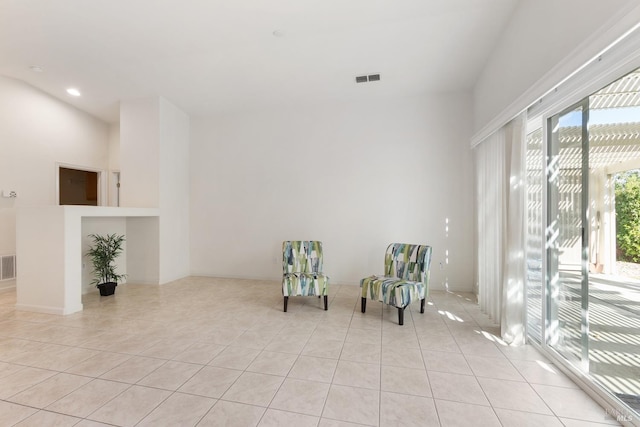 unfurnished room featuring light tile patterned floors, visible vents, and recessed lighting