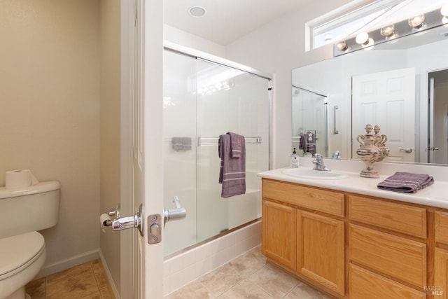 bathroom with vanity, tile patterned flooring, an enclosed shower, and toilet