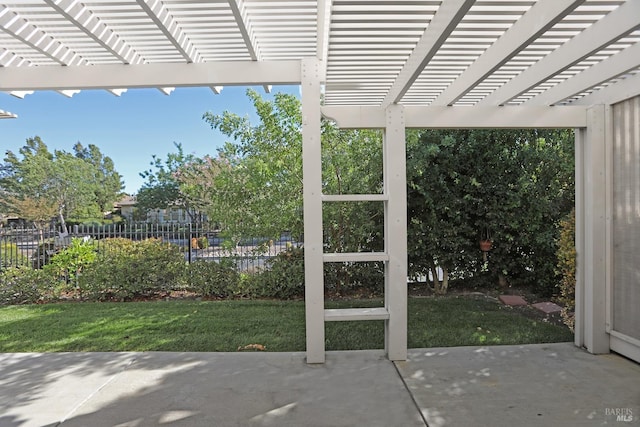 view of patio / terrace featuring fence and a pergola