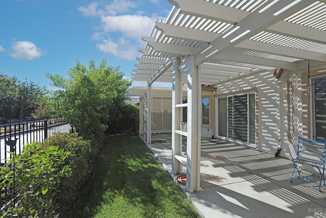 view of patio featuring fence and a pergola