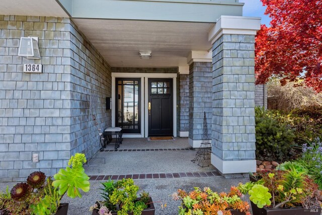 entrance to property with a porch