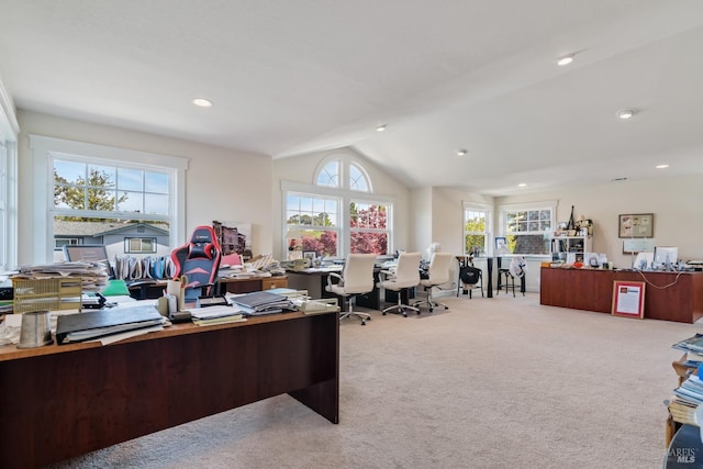 office featuring light colored carpet and vaulted ceiling