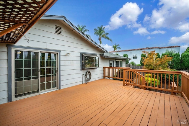 wooden terrace featuring a pergola