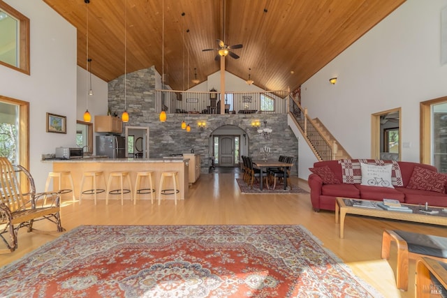 1280 W State Highway 20th St, Upper Lake, CA 95485 - living room with high vaulted ceiling, wood finished floors, stairway, arched walkways, and wooden ceiling