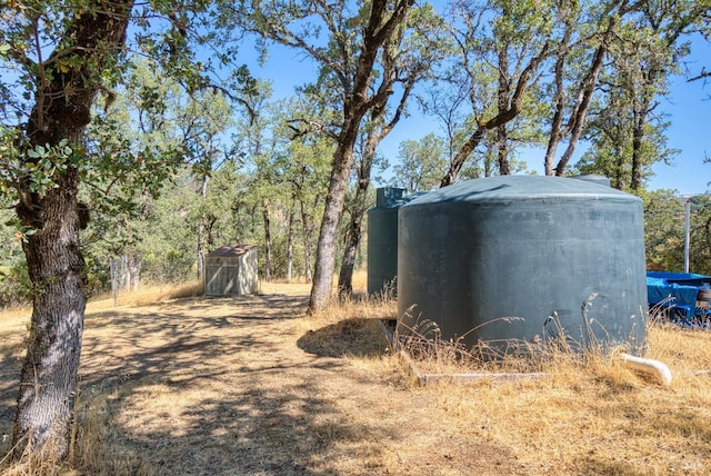1280 W State Highway 20th St, Upper Lake, CA 95485 - view of yard with a storage unit and an outdoor structure
