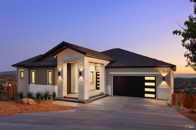 view of front of home with a garage