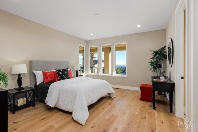 bedroom featuring light wood-type flooring