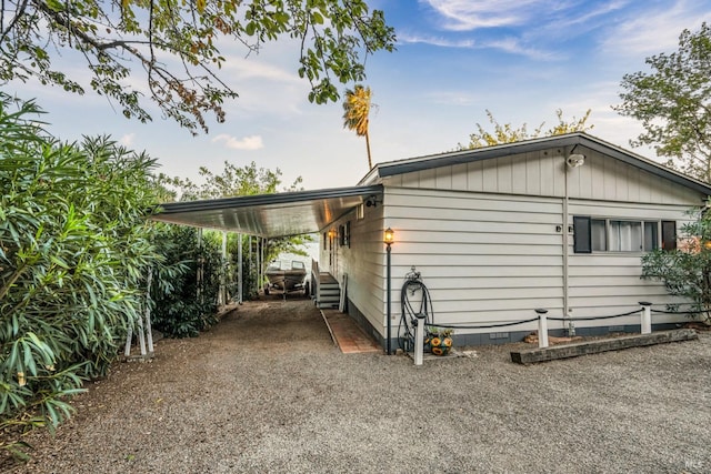 exterior space featuring a carport