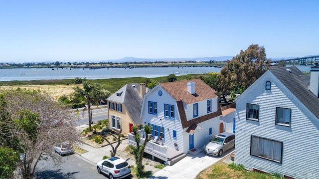 drone / aerial view with a water view