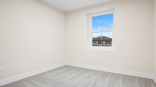 view of carpeted spare room