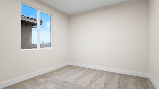 spare room with carpet flooring