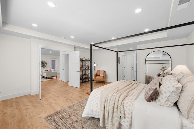 bedroom featuring light wood-type flooring