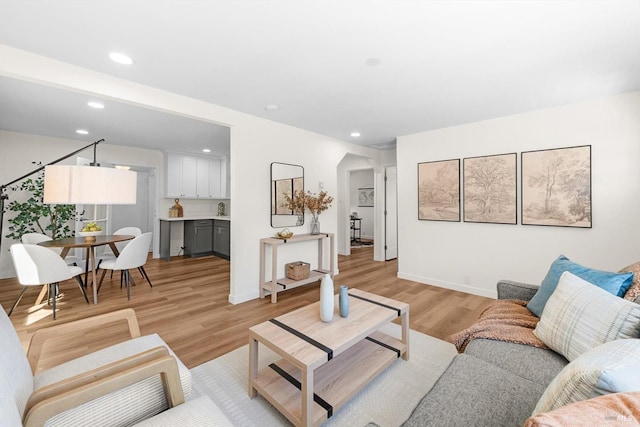 living room with light hardwood / wood-style floors