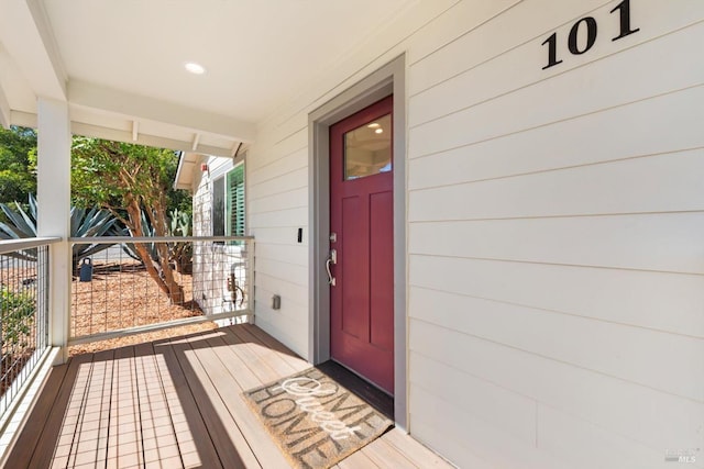 doorway to property featuring a porch