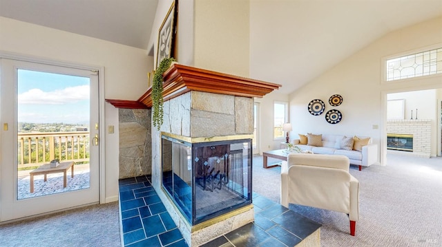 living room with dark colored carpet, a multi sided fireplace, and a wealth of natural light