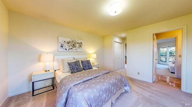 carpeted bedroom with a closet