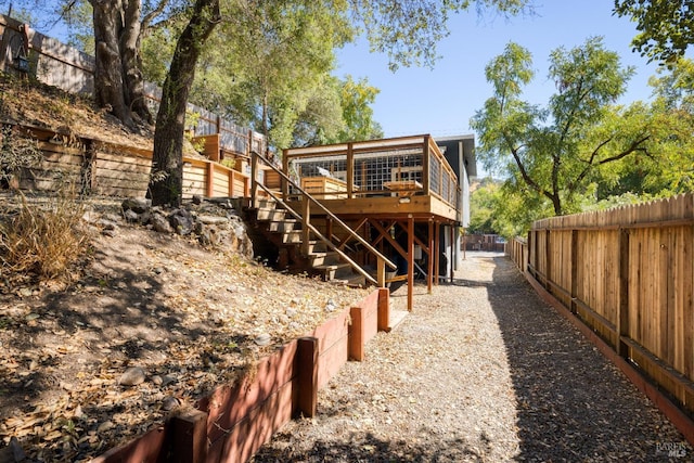 rear view of property with a deck