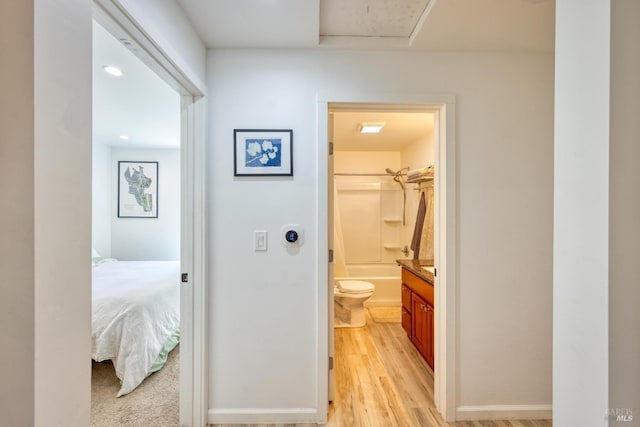 corridor featuring light hardwood / wood-style flooring