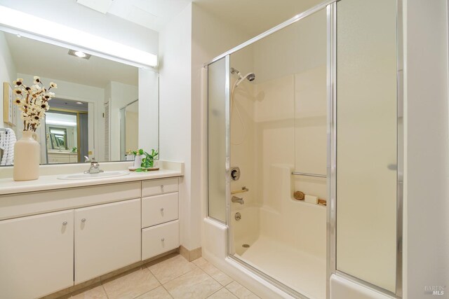 bathroom with vanity and tile patterned floors