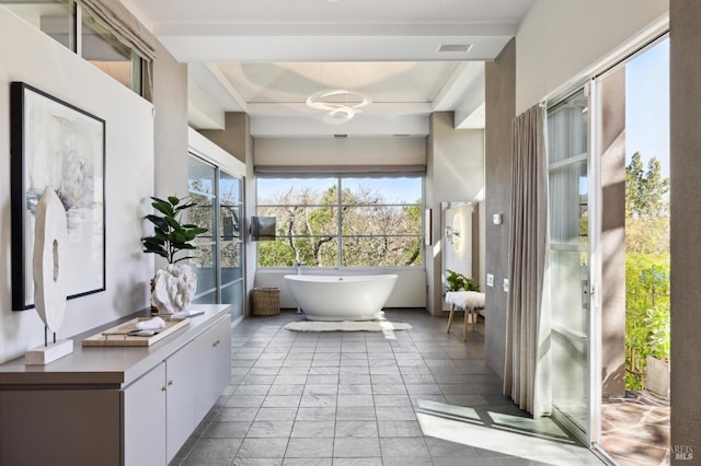 bathroom with a bath and vanity