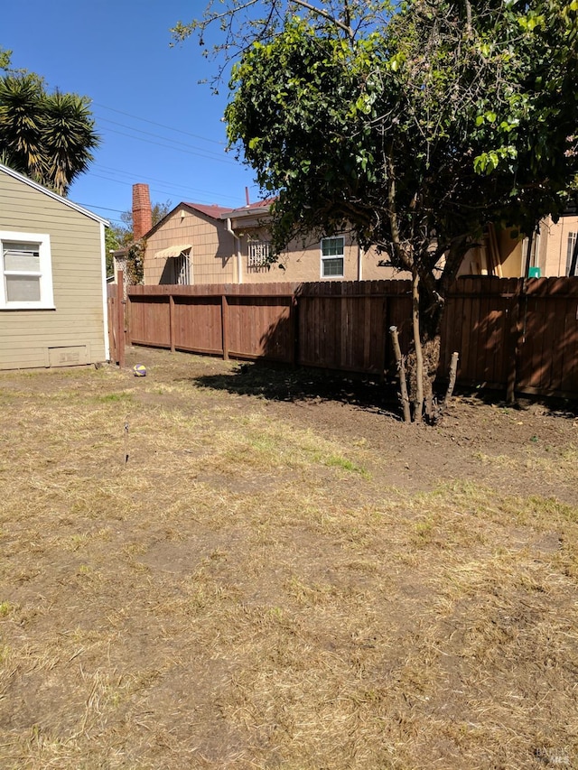 view of yard featuring fence