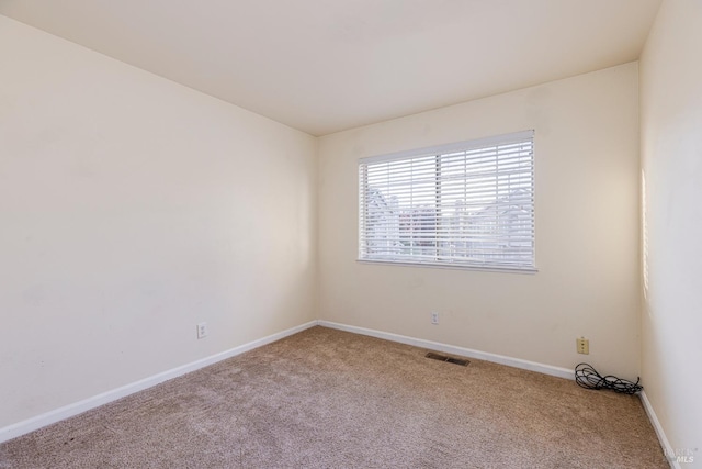 view of carpeted spare room