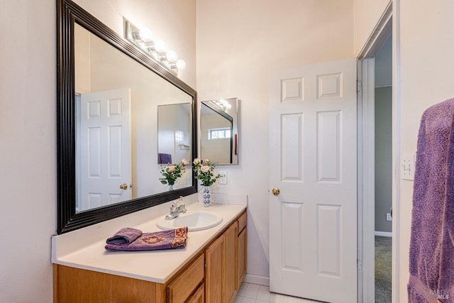 bathroom featuring vanity and tile patterned floors