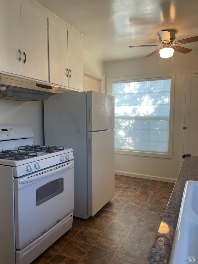 kitchen with white cabinetry, white range with gas stovetop, sink, and ceiling fan