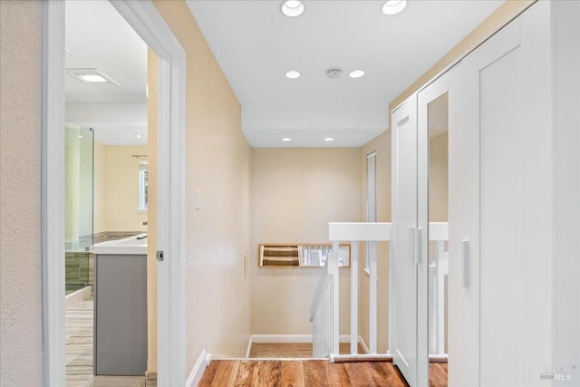 hall featuring light hardwood / wood-style floors