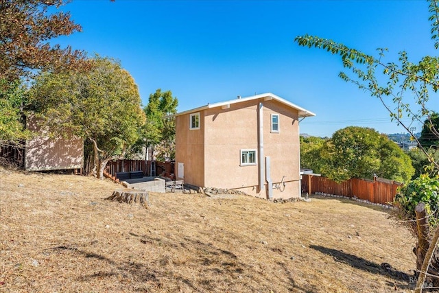 rear view of property with a patio area