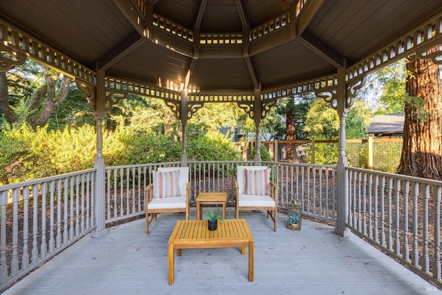 view of patio / terrace featuring a gazebo and a deck