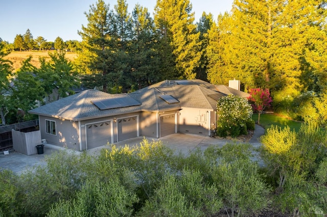 garage featuring solar panels