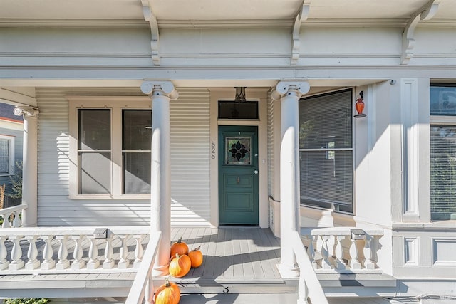 entrance to property with covered porch