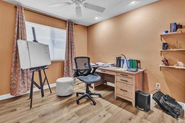 office area featuring ceiling fan and light wood-type flooring