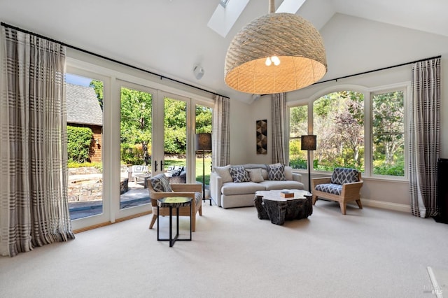 114 Van Tassel Ct, San Anselmo, CA 94960 - carpeted living area featuring plenty of natural light, high vaulted ceiling, baseboards, and a skylight
