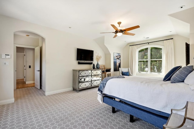 bedroom with carpet, lofted ceiling, and ceiling fan