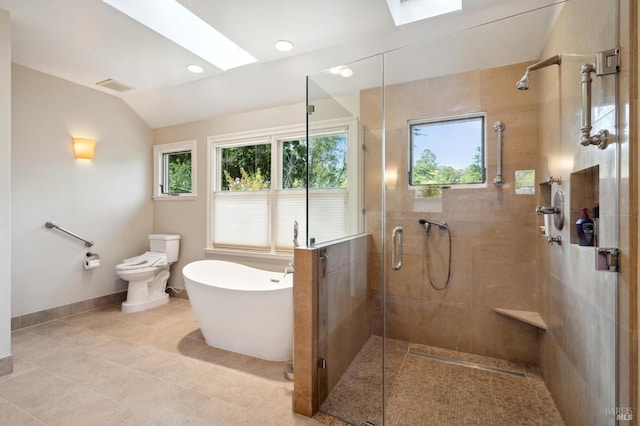 114 Van Tassel Ct, San Anselmo, CA 94960 - full bath featuring visible vents, a stall shower, baseboards, lofted ceiling with skylight, and a freestanding bath