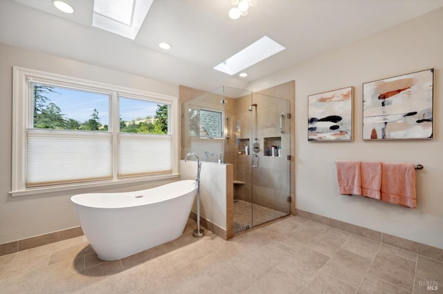 bathroom with a skylight and plus walk in shower