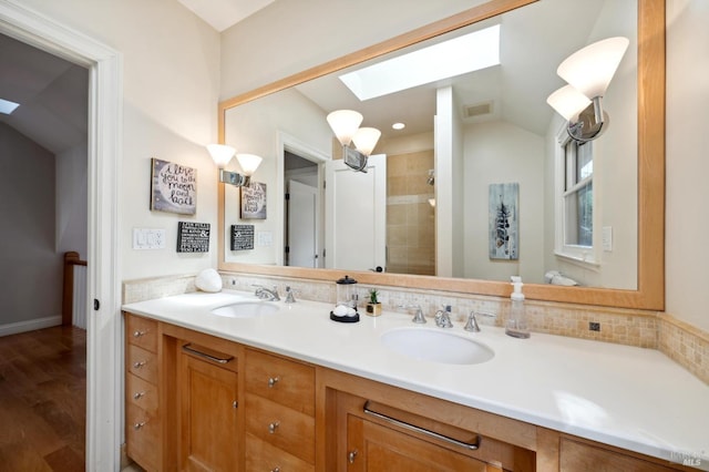 114 Van Tassel Ct, San Anselmo, CA 94960 - bathroom with double vanity, visible vents, a tile shower, and a sink
