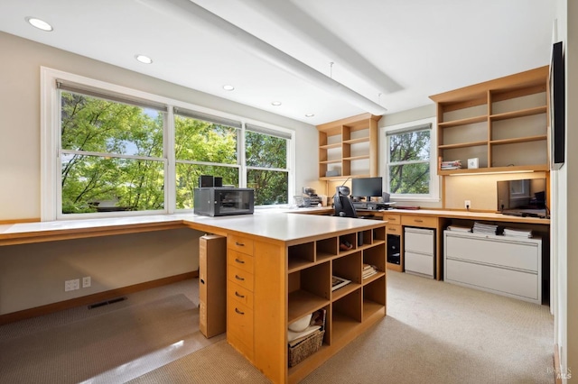 office area featuring light carpet and built in desk