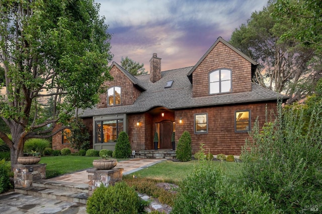 114 Van Tassel Ct, San Anselmo, CA 94960 - view of front of home featuring a lawn, a shingled roof, and a chimney