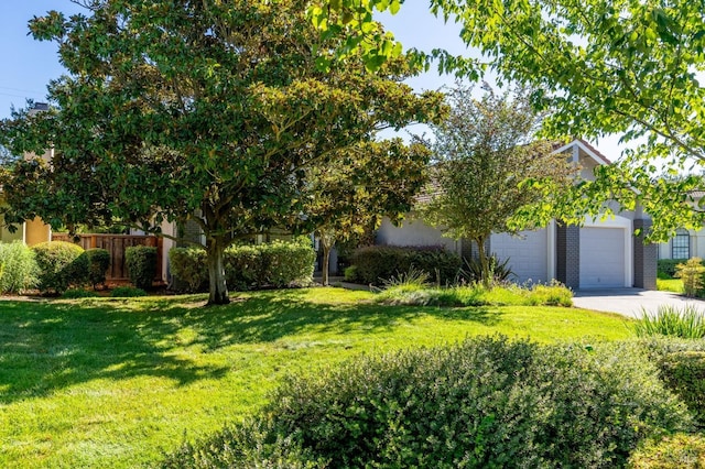 view of yard with a garage