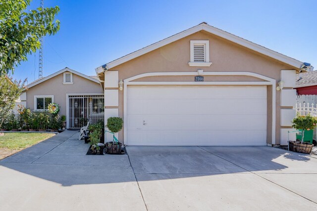 ranch-style home with a garage