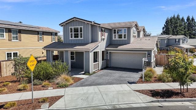 front of property with a garage