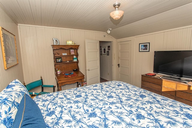 bedroom featuring vaulted ceiling