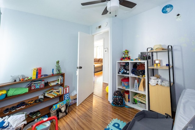 interior space featuring ceiling fan and light hardwood / wood-style flooring