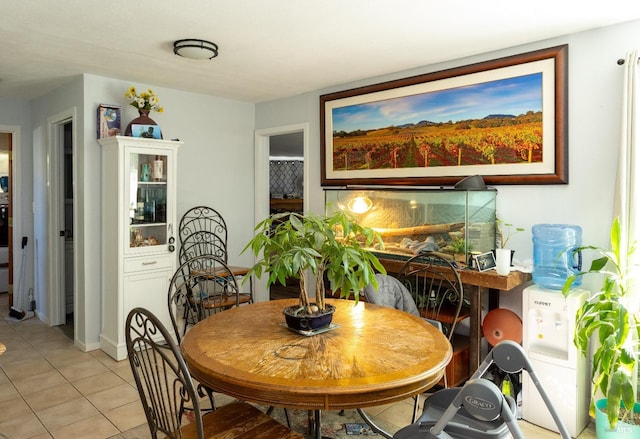 dining space with light tile patterned flooring