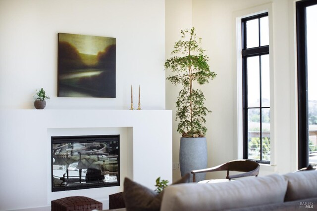 living room with plenty of natural light