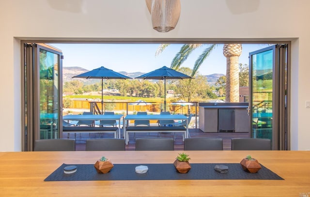 dining space with a mountain view